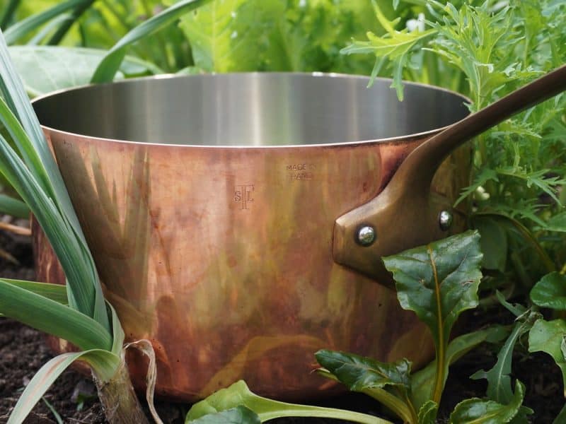 garden broth-copper soup pot in the garden