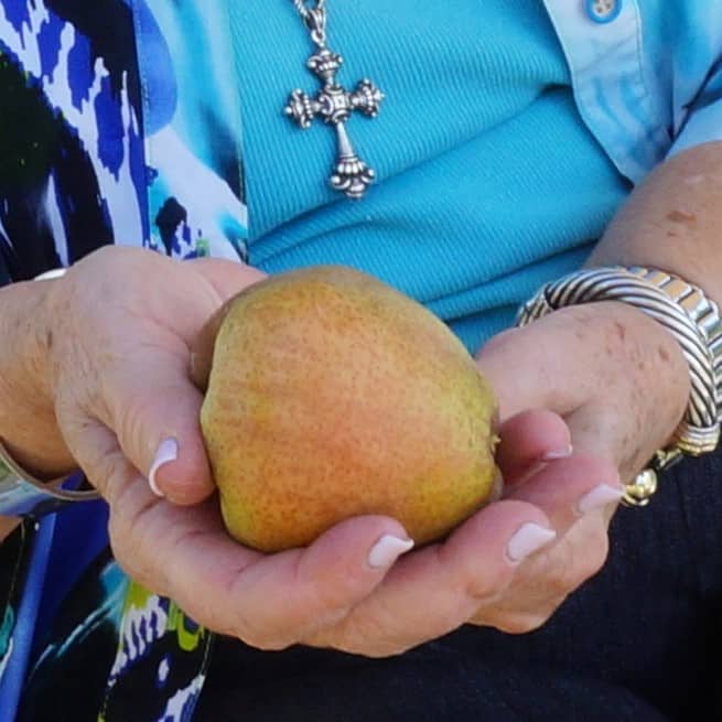 gift in hand from Carol Miller Kelley Orchard