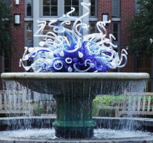 water fountain with Chihuly glass sculpture cools and refreshes the Atlanta Botanical Garden