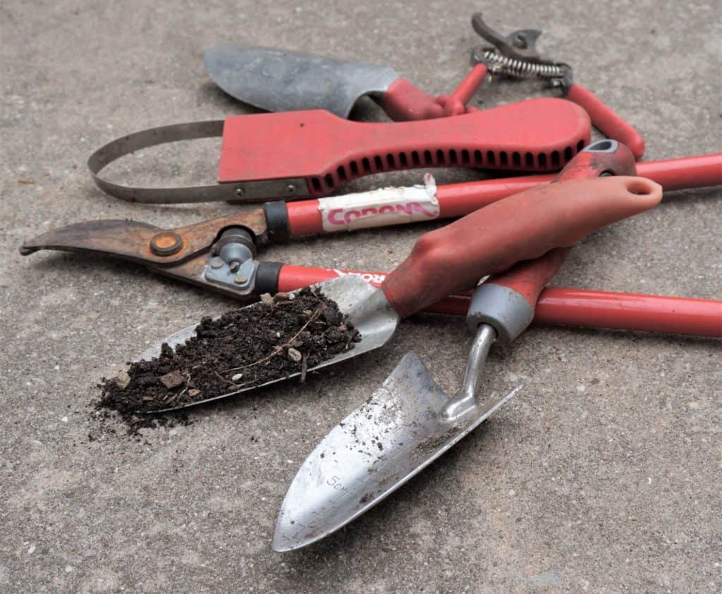 garden tools pile up for work word worship