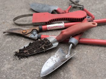 garden tools pile up for work word worship