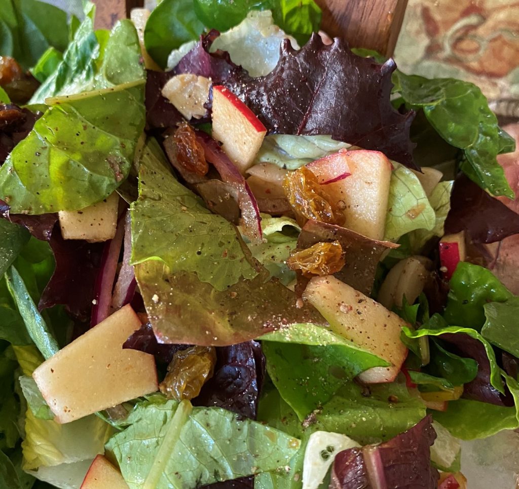 raisins and apples paired with savory salad ingredients