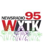 WXTK radio logo with flowers