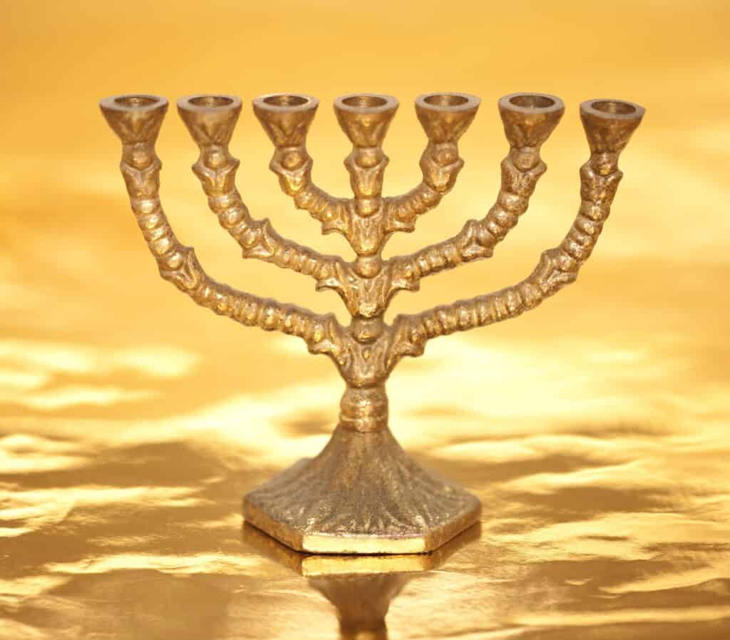 garden glimpses of God - a golden  menorah standing in as Holy Spirit