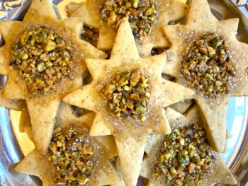 pistachio coookies on a silver plate