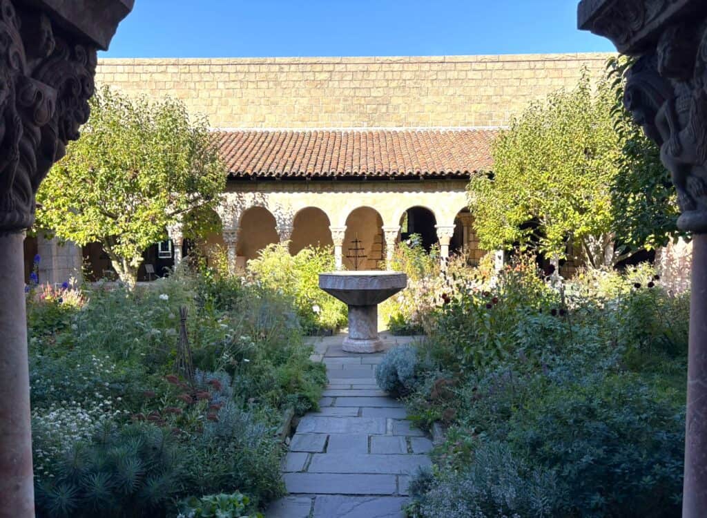 view of the Judy Black Garden with a central fountain at The Met Cloisters, a true garden sanctuary in New York