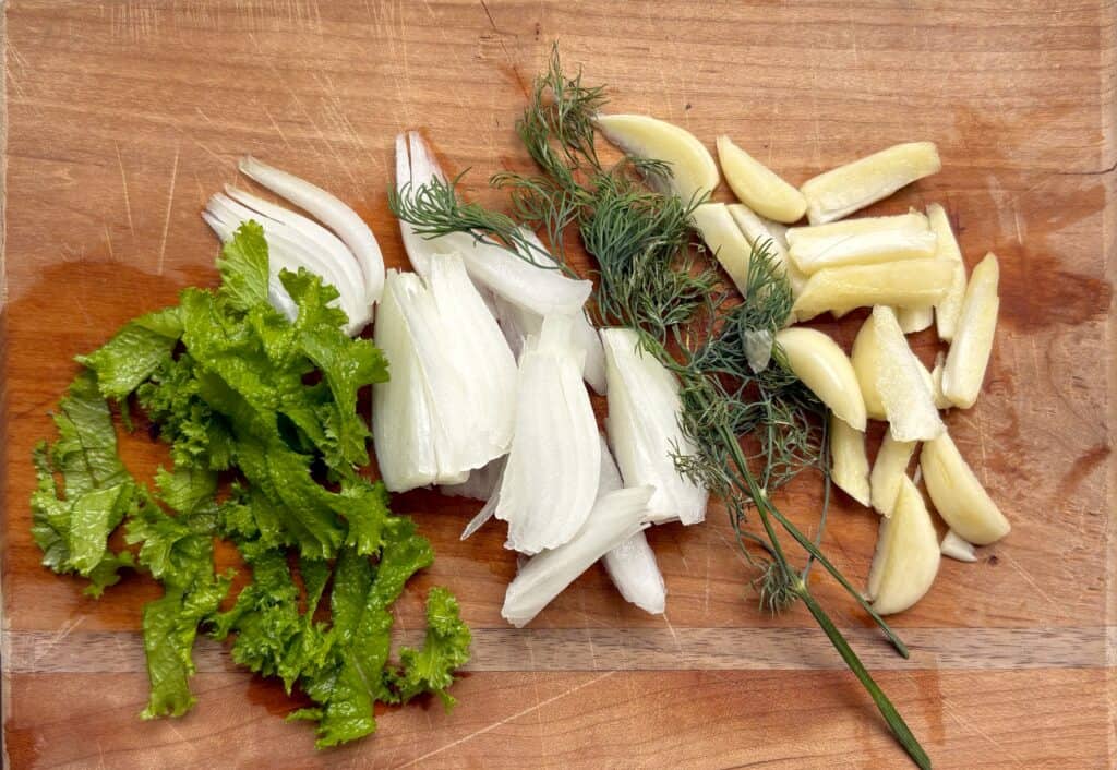 chopped garden fresh ingredients for pickle recipe